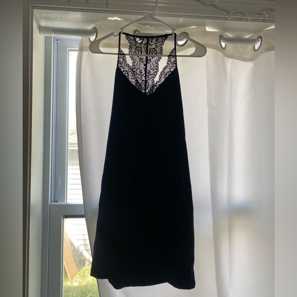 Mini black dress with lace back; NEVER USED